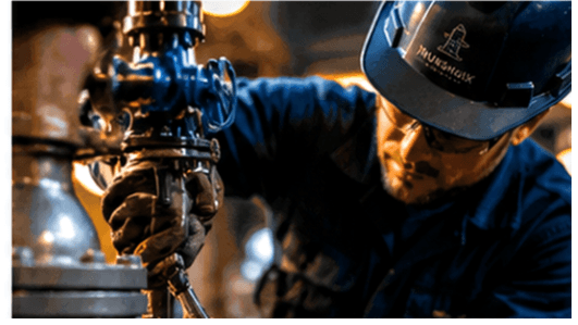 Inukshuk Industrial technician servicing water infrastructure equipment
